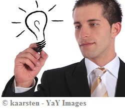 young-business-man-drawing-an-electric-bulb