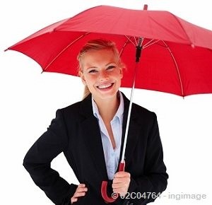 Beautiful young girl holding an umbrella