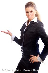 Girl in black formal dress indicating towards her right