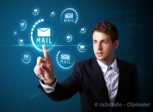 Businessman pressing virtual email icon