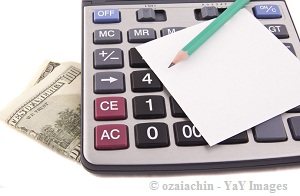 calculator with money and notepad