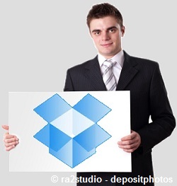 guy-in-black-suit-holding-a-dropbox-card