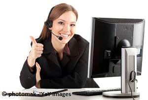 young virtual assistant lady with a thumbs up while sitting on her workstation